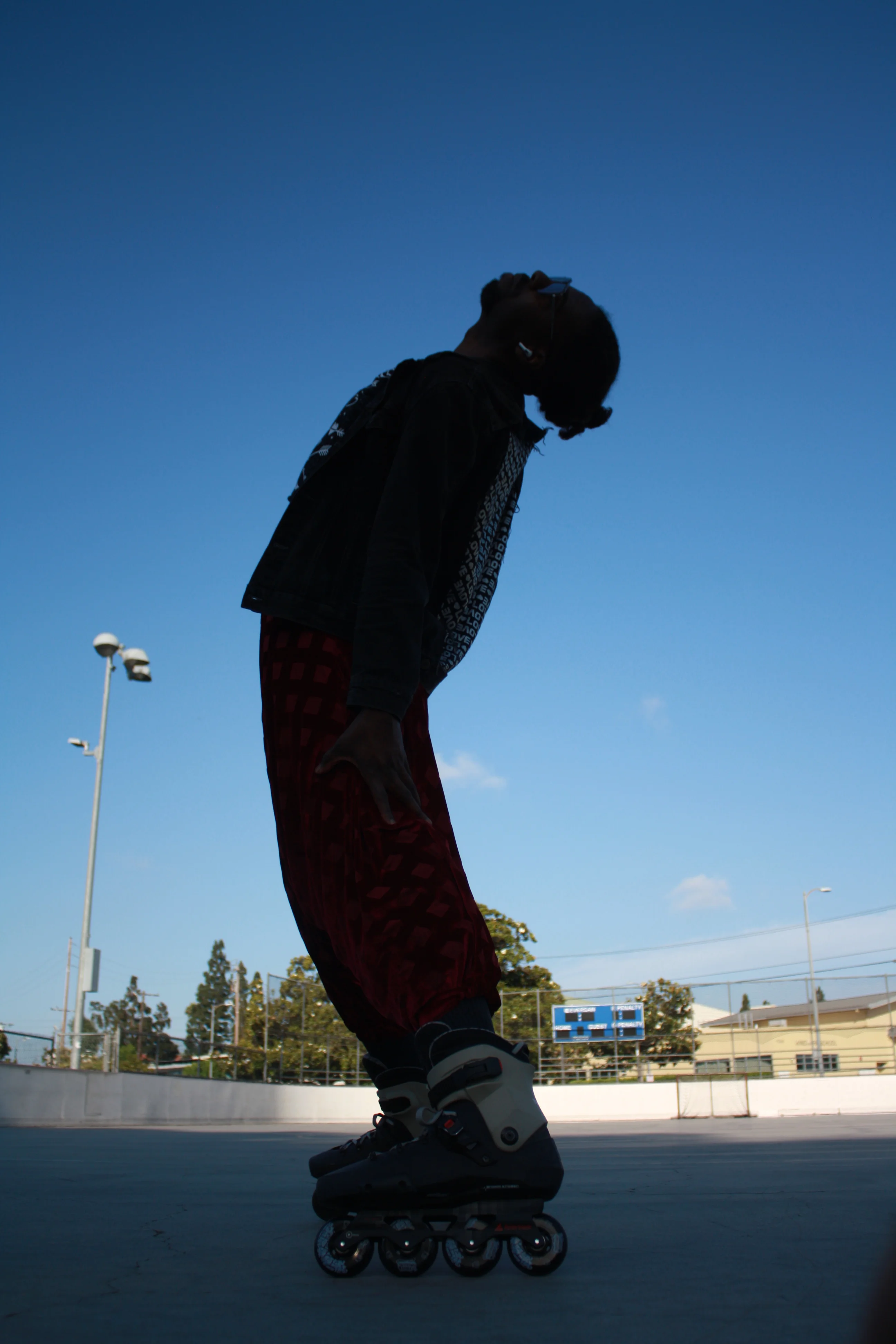 Coco Lavelle skating at an outdoor rink